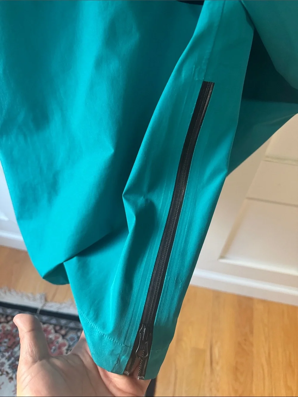 The North Face Men's Two-Tone Hooded Anorak Rain Jacket in Teal and Black